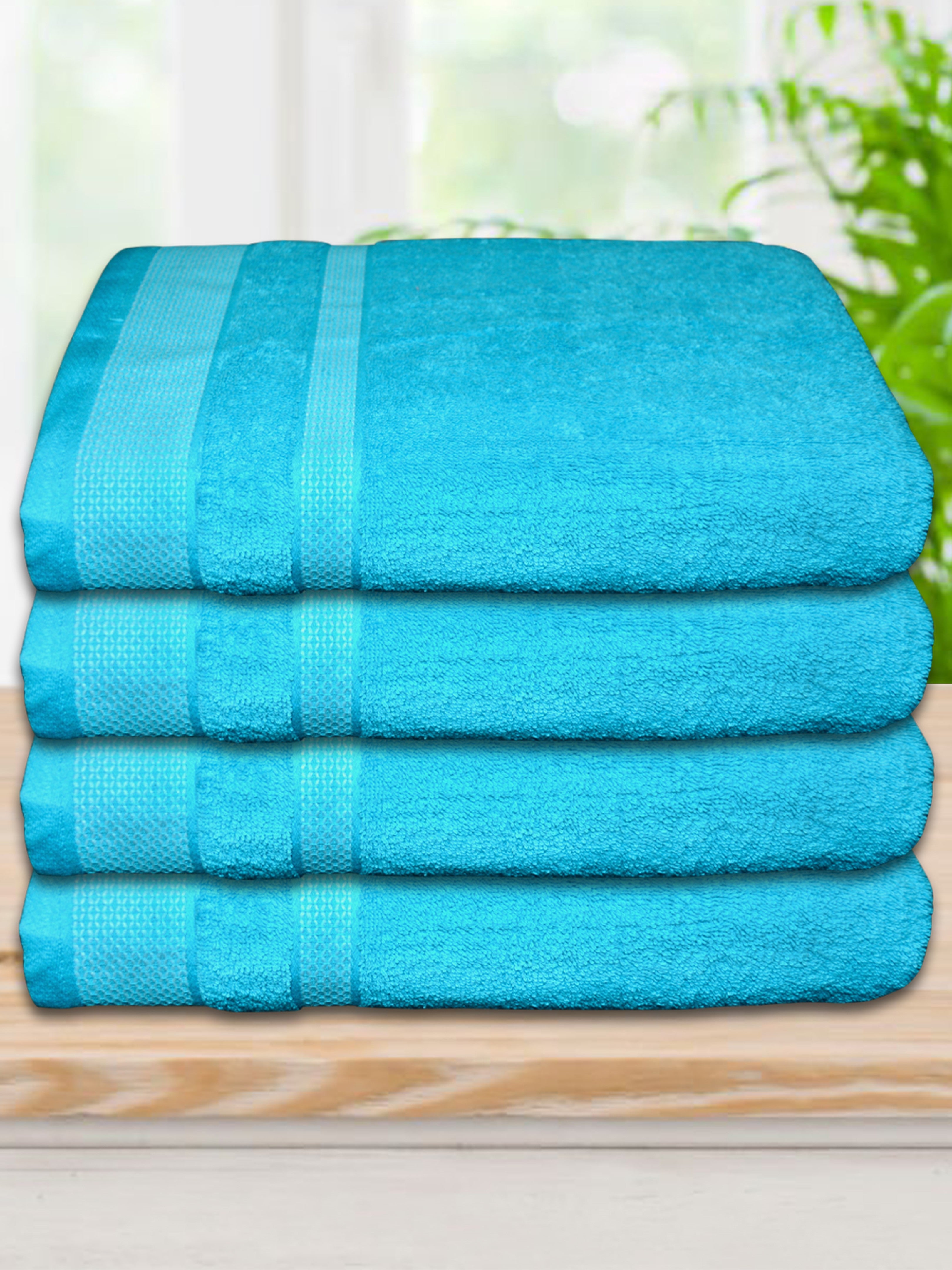 Athom Living 4-piece premium cotton bath towel set, crafted with high absorbency and softness, ideal for home, spa, gym, or gifting purposes.