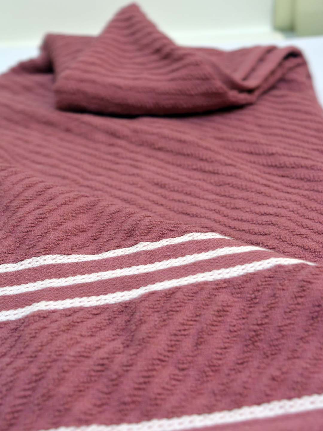 Athom Living Terry Towels Pack of 4 with diagonal stripe design. Super soft, absorbent, and easy to wash, perfect for daily bath essentials and modern bathroom décor.