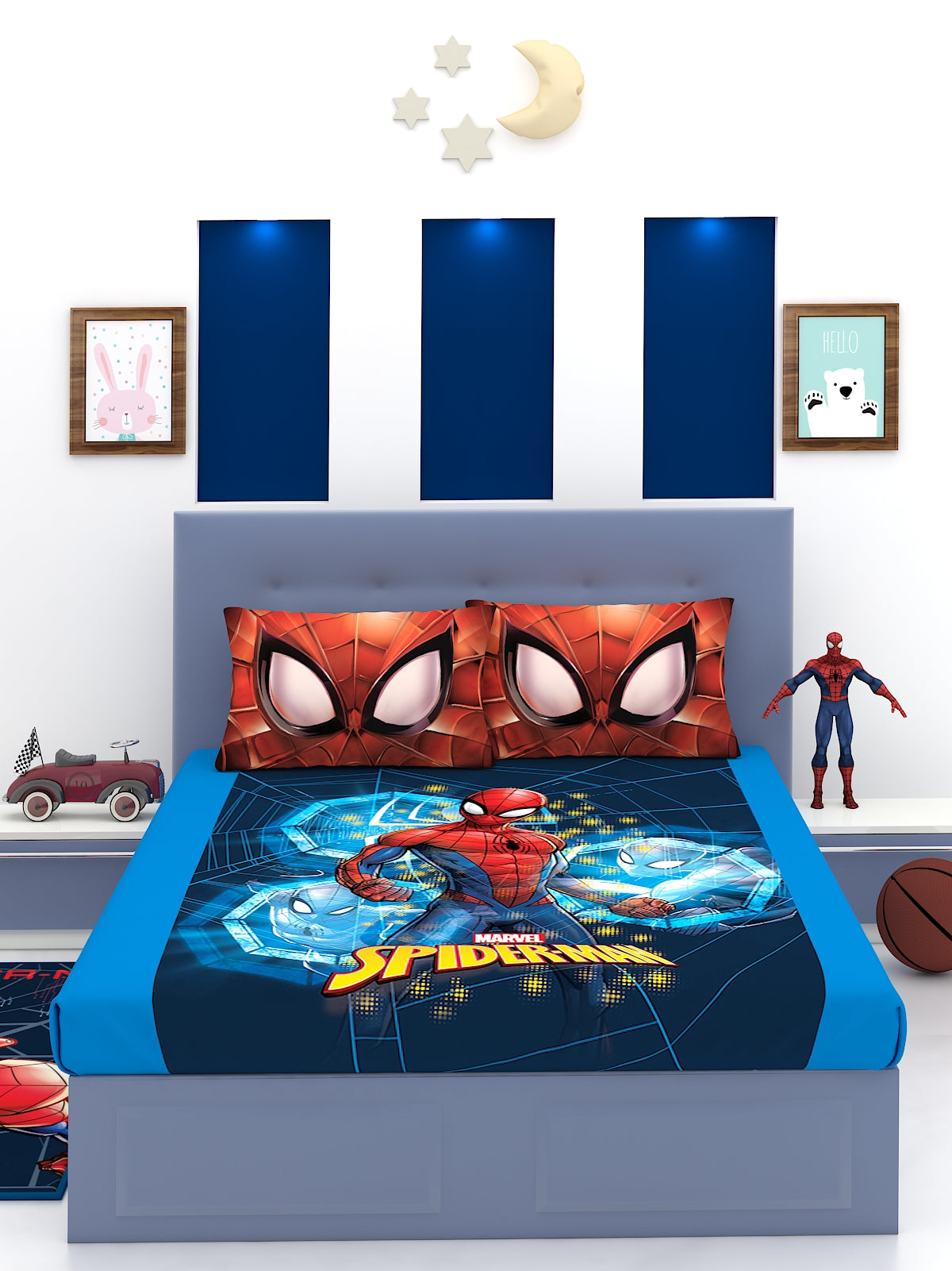 a blue bed with a blue comforter and pillows