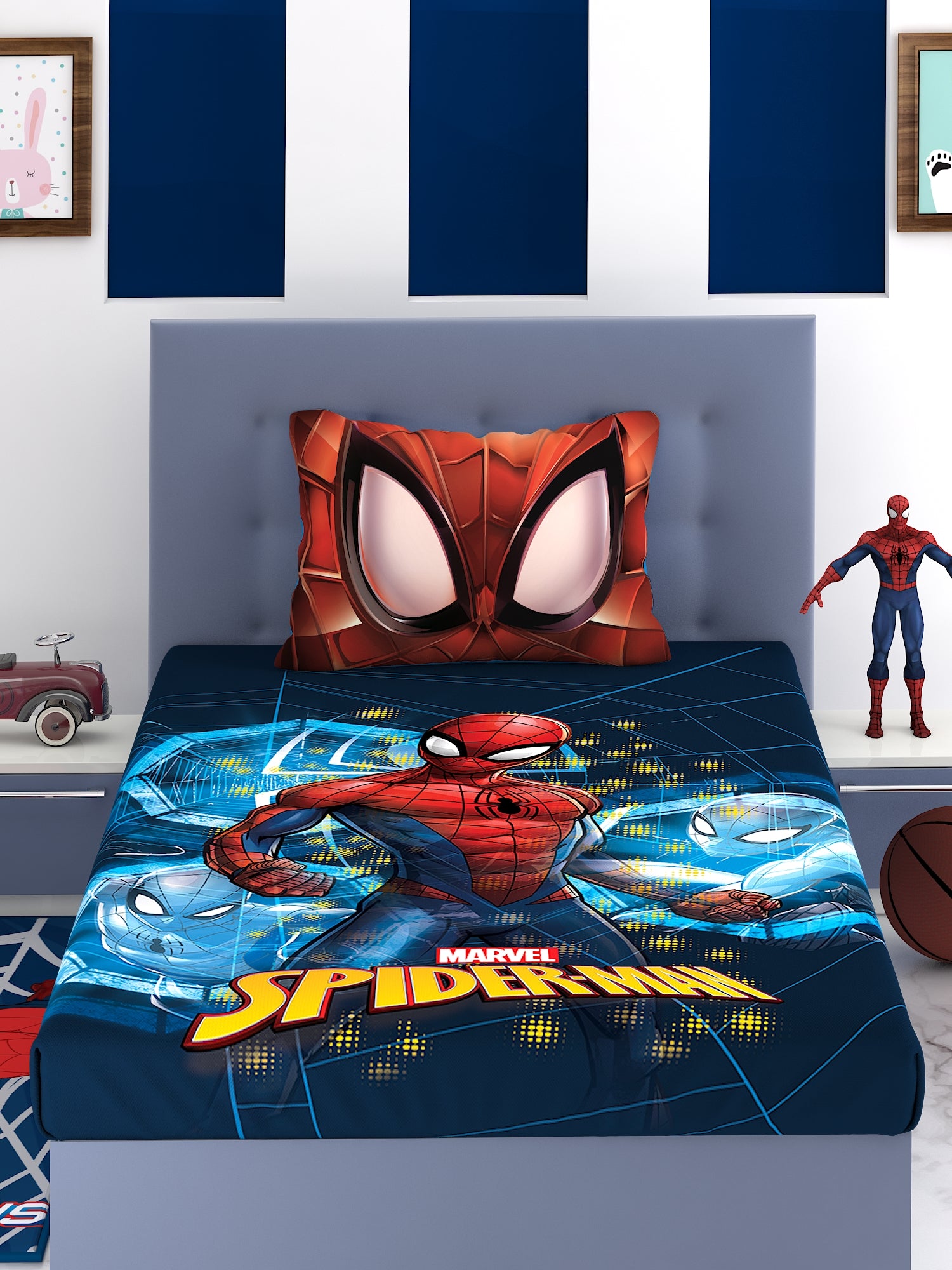 a bed with a colorful comforter and pillows
