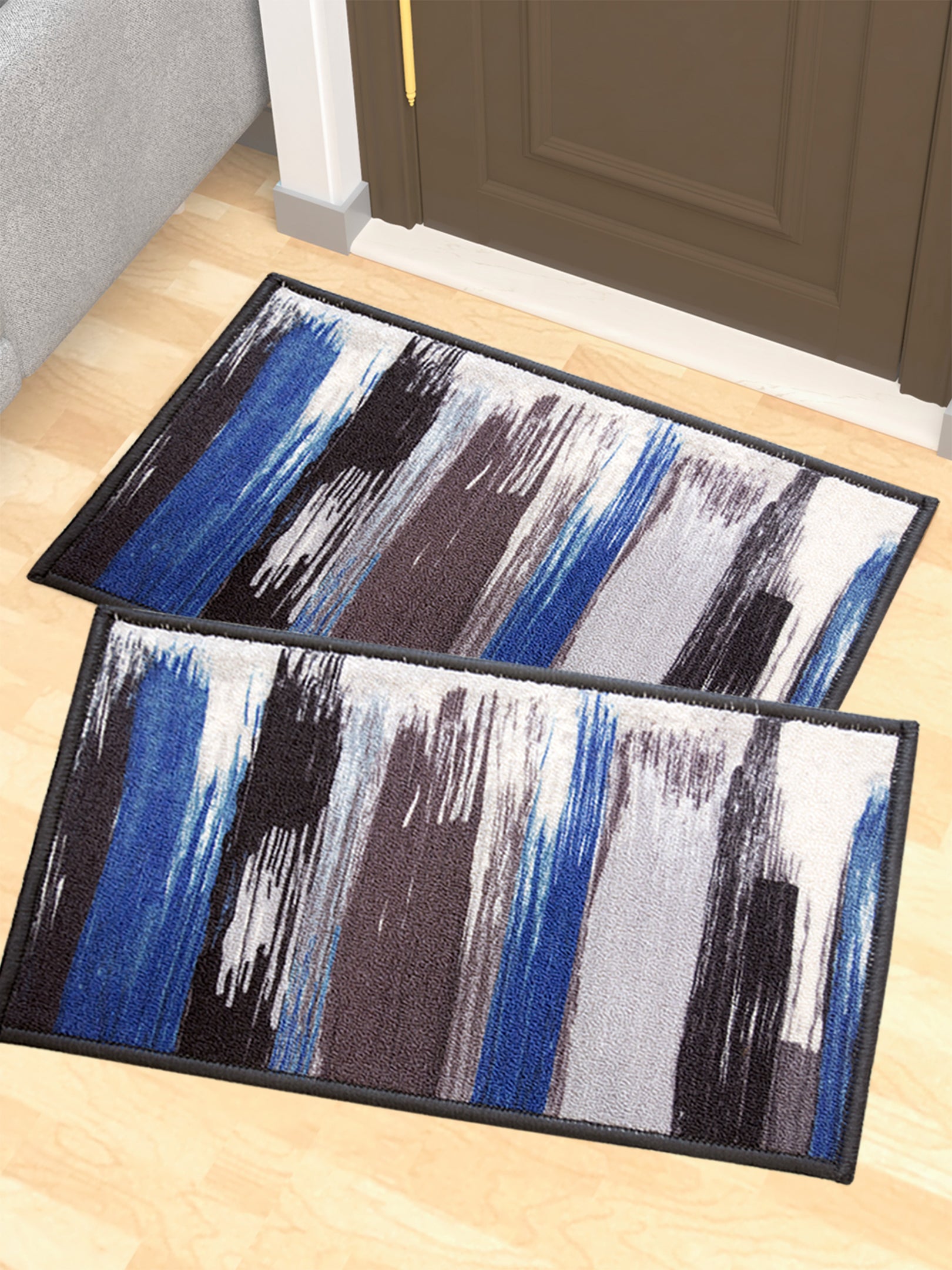 A premium blue printed anti-slip doormat pack of 2 designed for modern homes, featuring durable fabric, strong grip backing, and elegant canvas patterns ideal for entryways, hallways, and indoor flooring.