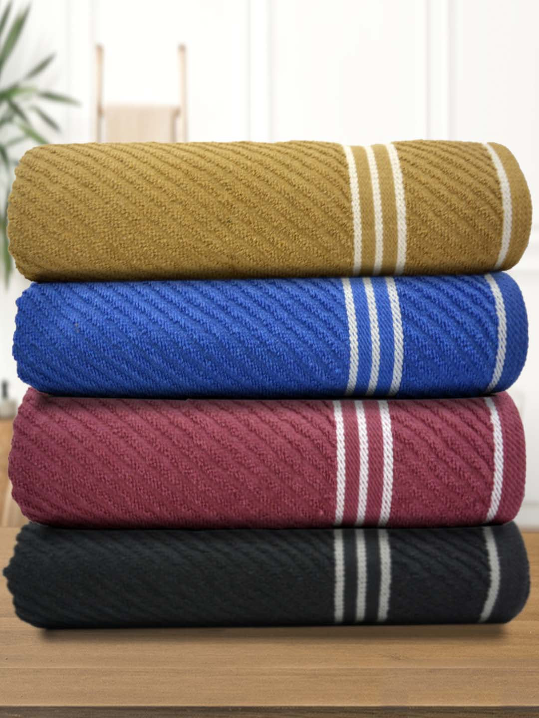 Athom Living Diagonal Stripe Terry Towel pack of 4, premium cotton towels with soft texture, high absorbency, stylish design and long-lasting comfort.