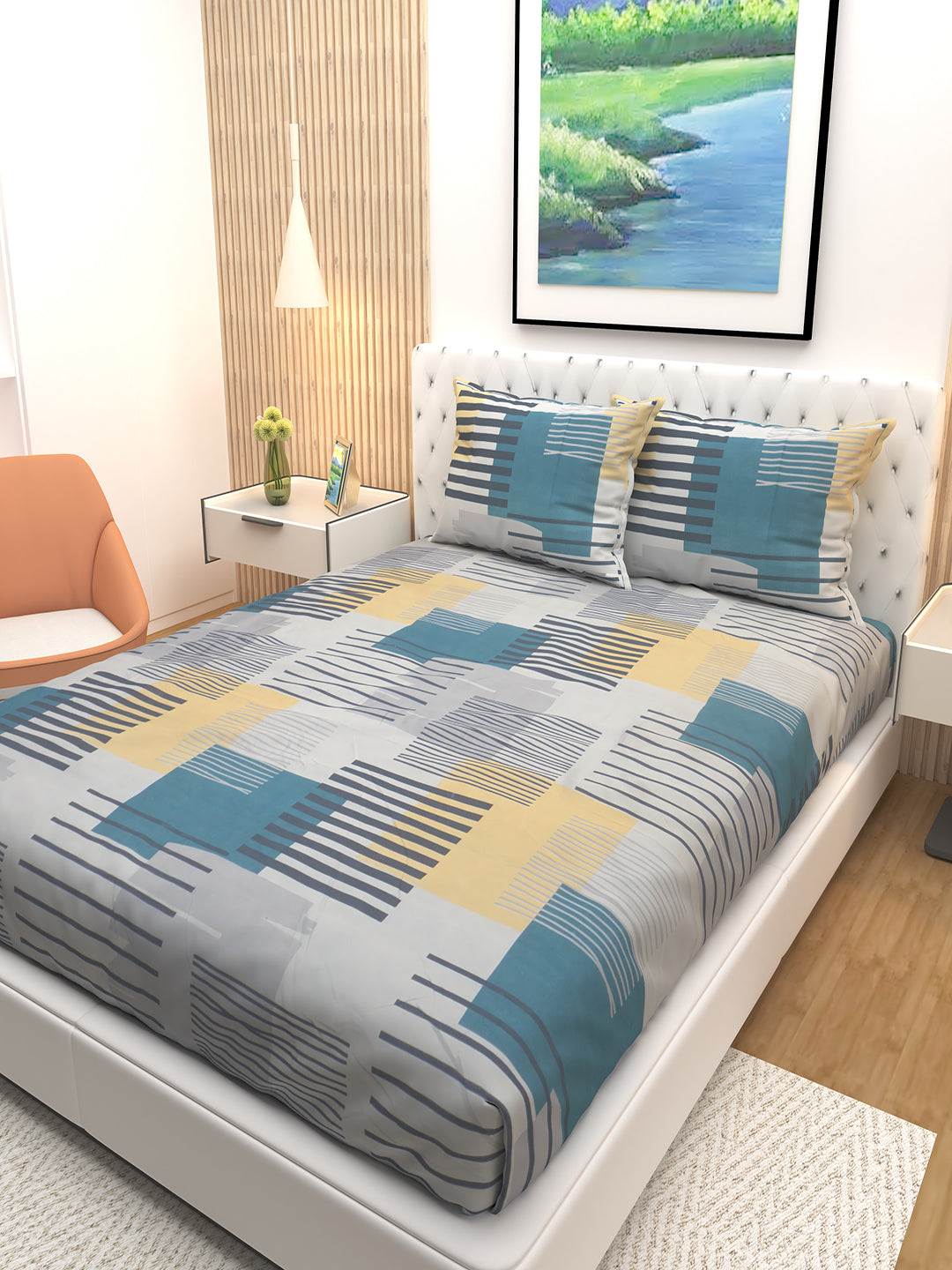 Athom Living Premium Blossom Blue Stripes double bedsheet set featuring coordinated pillows, offering a stylish striped pattern, durable material, and elegant look to elevate any bedroom interior effortlessly.