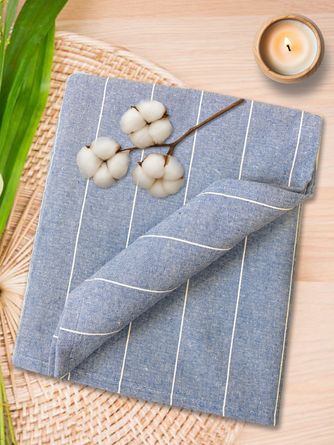 Athom Living sky blue cotton chaddar featuring summer stripe patterns. This lightweight bedsheet is soft, durable, and suitable for all seasons, adding elegance and comfort to your sleeping space.