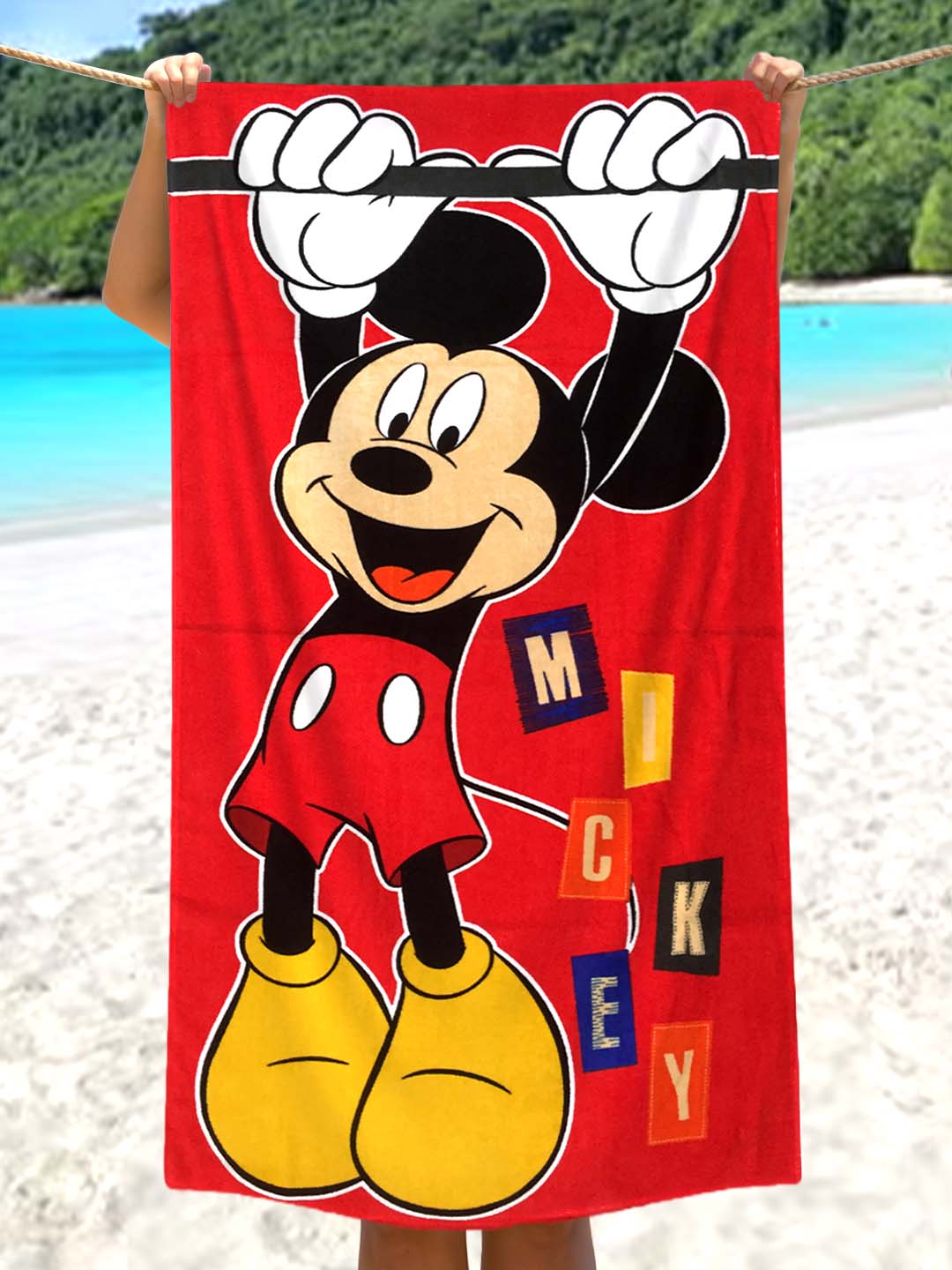 Bright and soft Disney Mickey Mouse red kids bath towel by Athom Living, made of cotton for ultimate comfort and absorbency, perfect for toddlers and young children after bath time.
