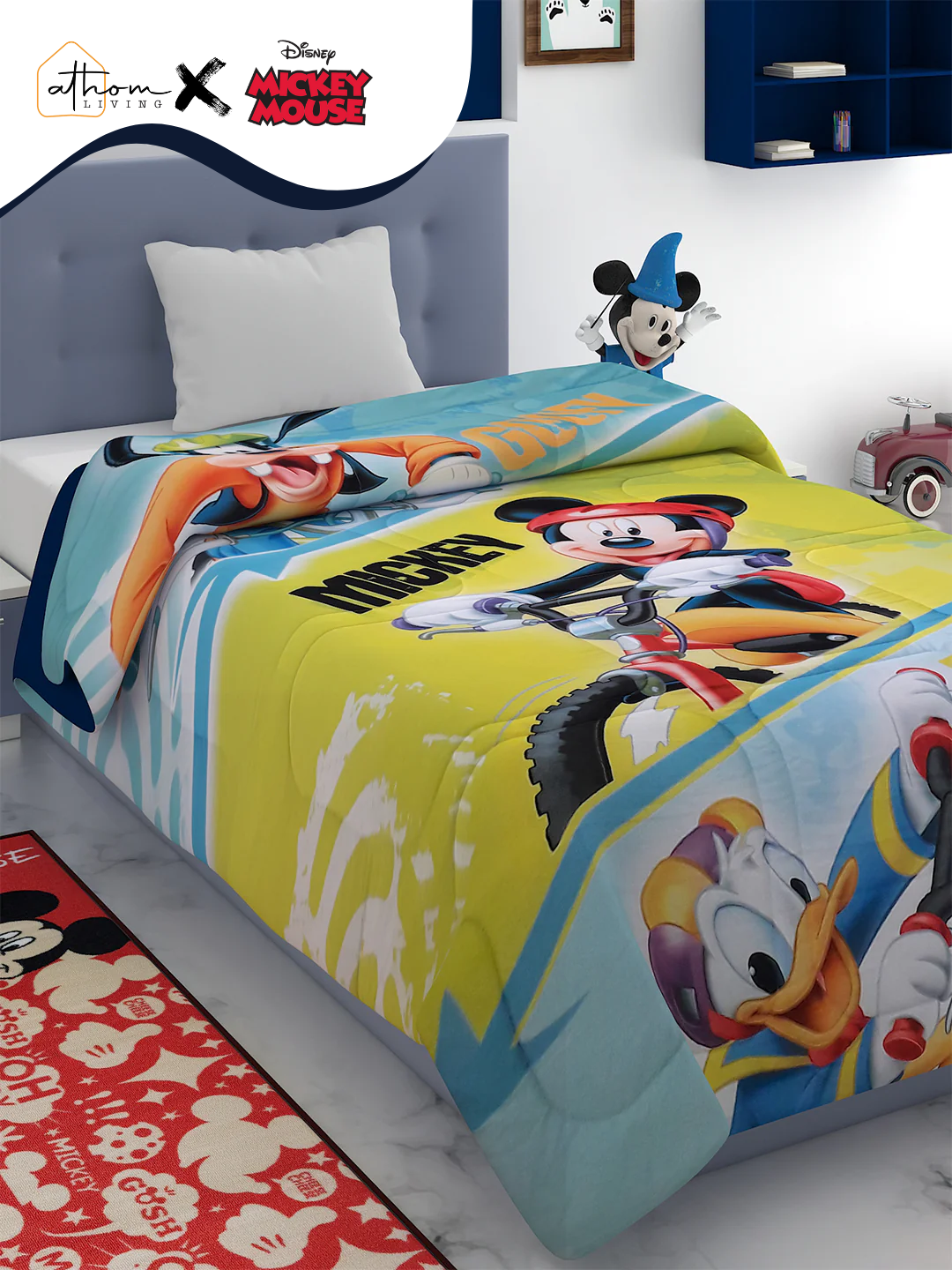 Disney Mickey Mouse kids comforter single size 135x220 cm with 360 GSM poly-fill thickness, high-resolution digital print design featuring Mickey, Goofy & Donald by Athom Living.