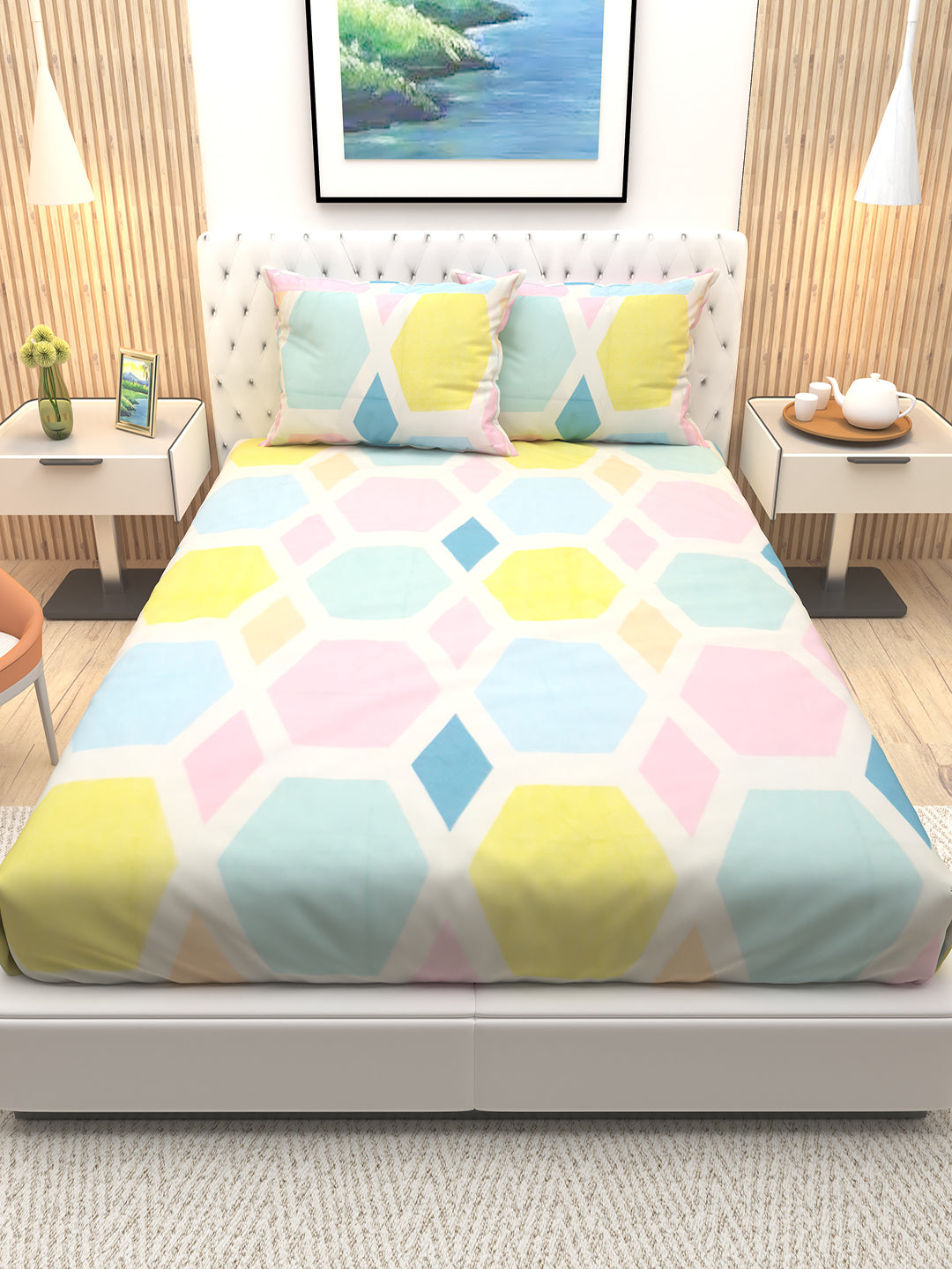Marigold hexagonal double bedsheet by Athom Living displayed neatly with two matching pillows, showcasing vibrant design, soft fabric, and premium quality bedsheet ideal for modern bedroom décor.