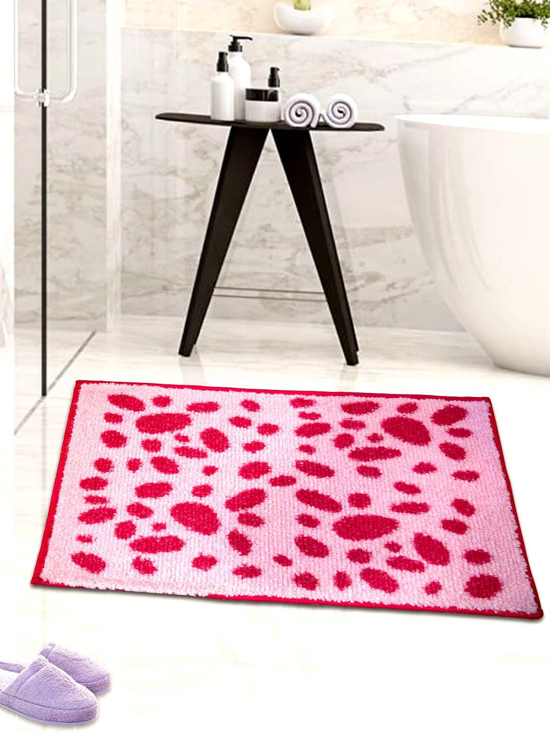 Pink Dotted Micro Designer Soft Anti Slip Bath Mat by Athom Living, a stylish and cozy doormat or bathmat for home use, providing comfort, safety, and vibrant design for any bathroom or entryway.