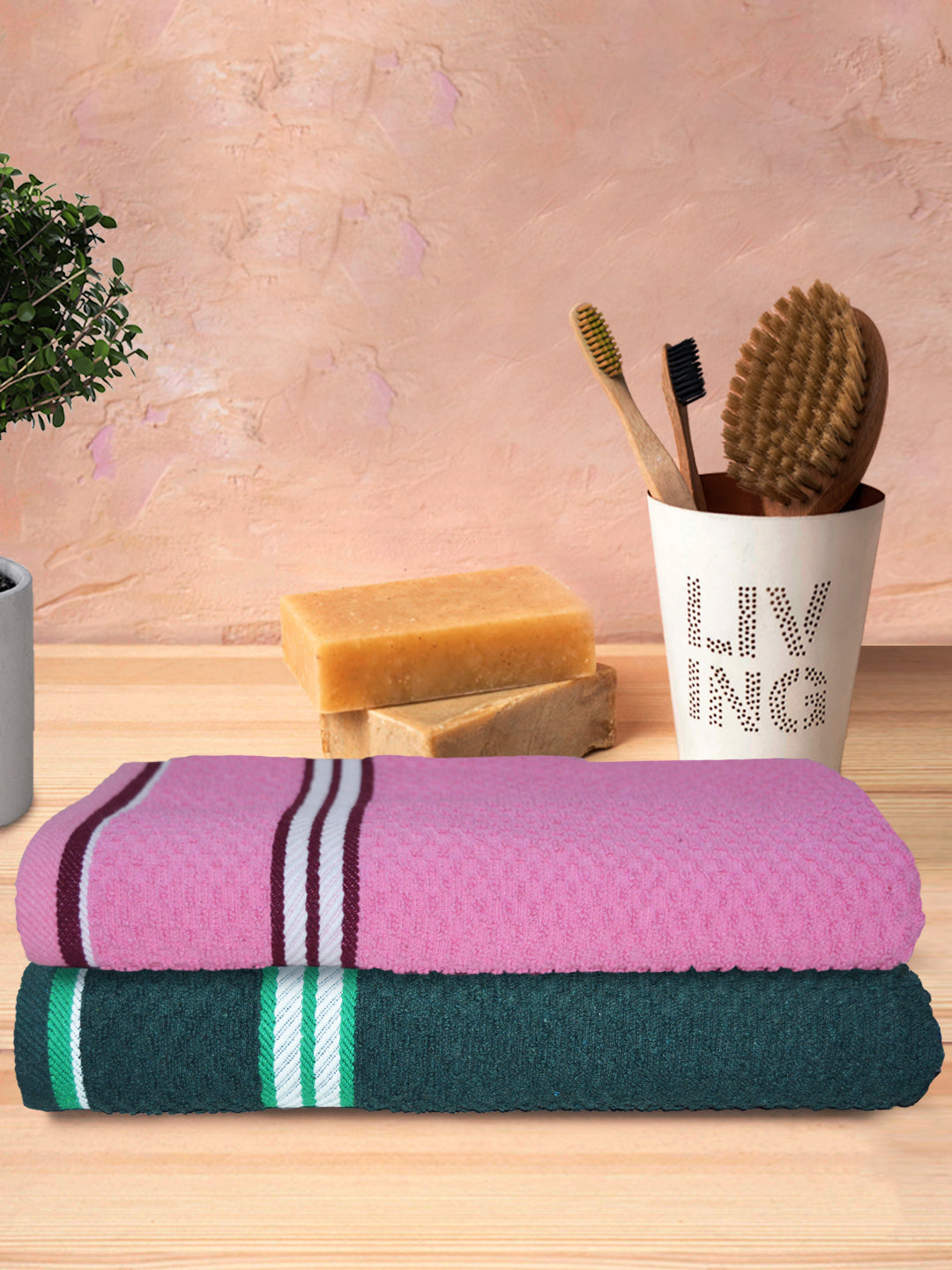 Pink and dark green cotton bath towels