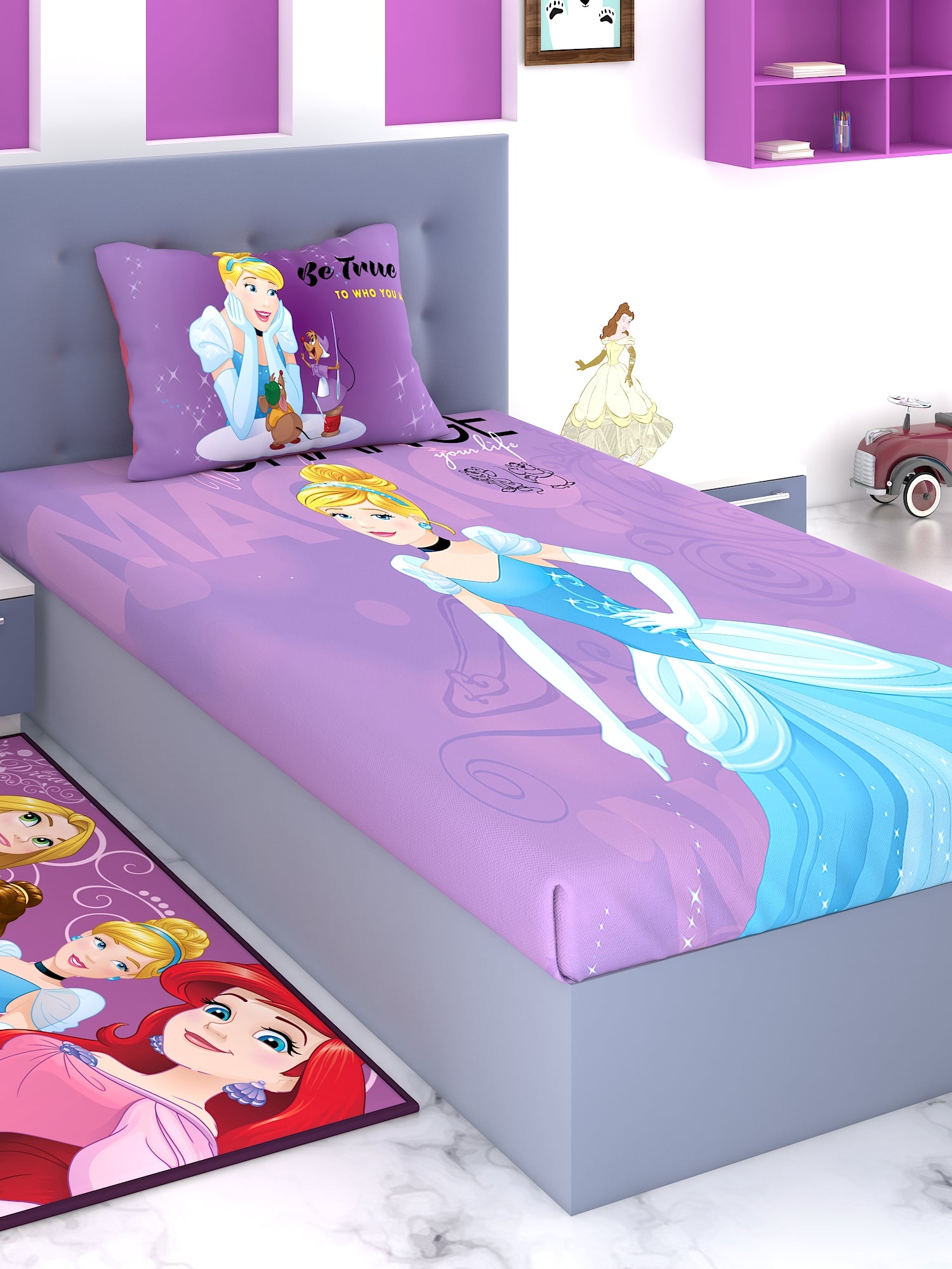 a bed with a purple blanket and a pink pillow 