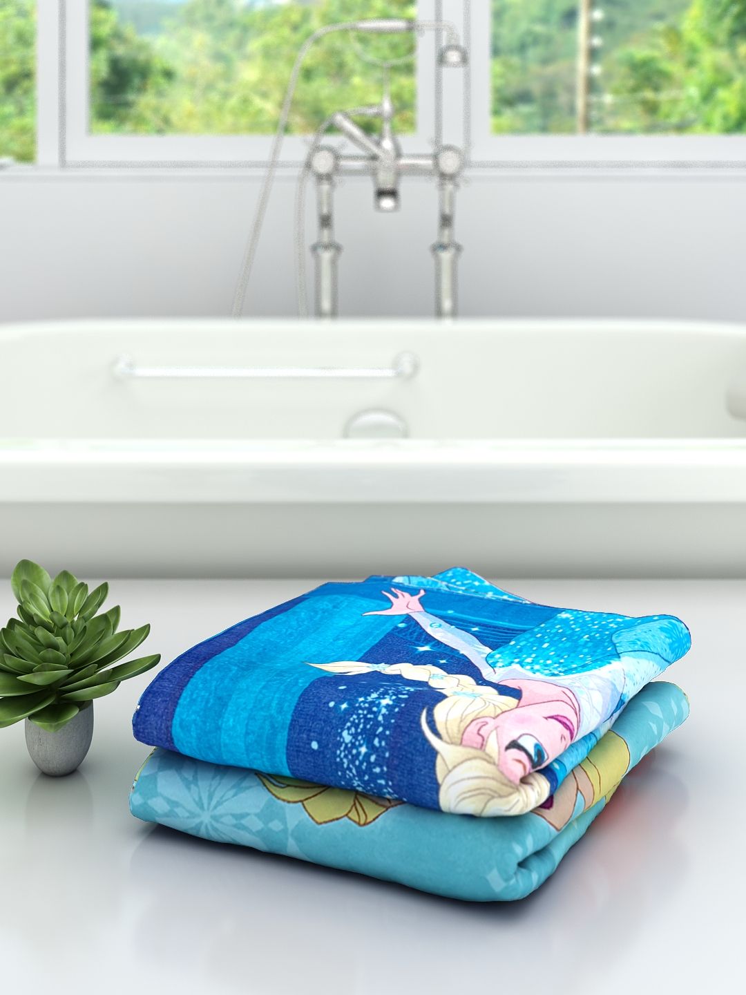 Kids Bath Towel set with Disney Frozen Elsa Dream Of Magic design by Athom Living, medium size 60x120 cm, pack of 2, made from absorbent cotton, ideal for kids bathroom, pool, travel and beach fun.