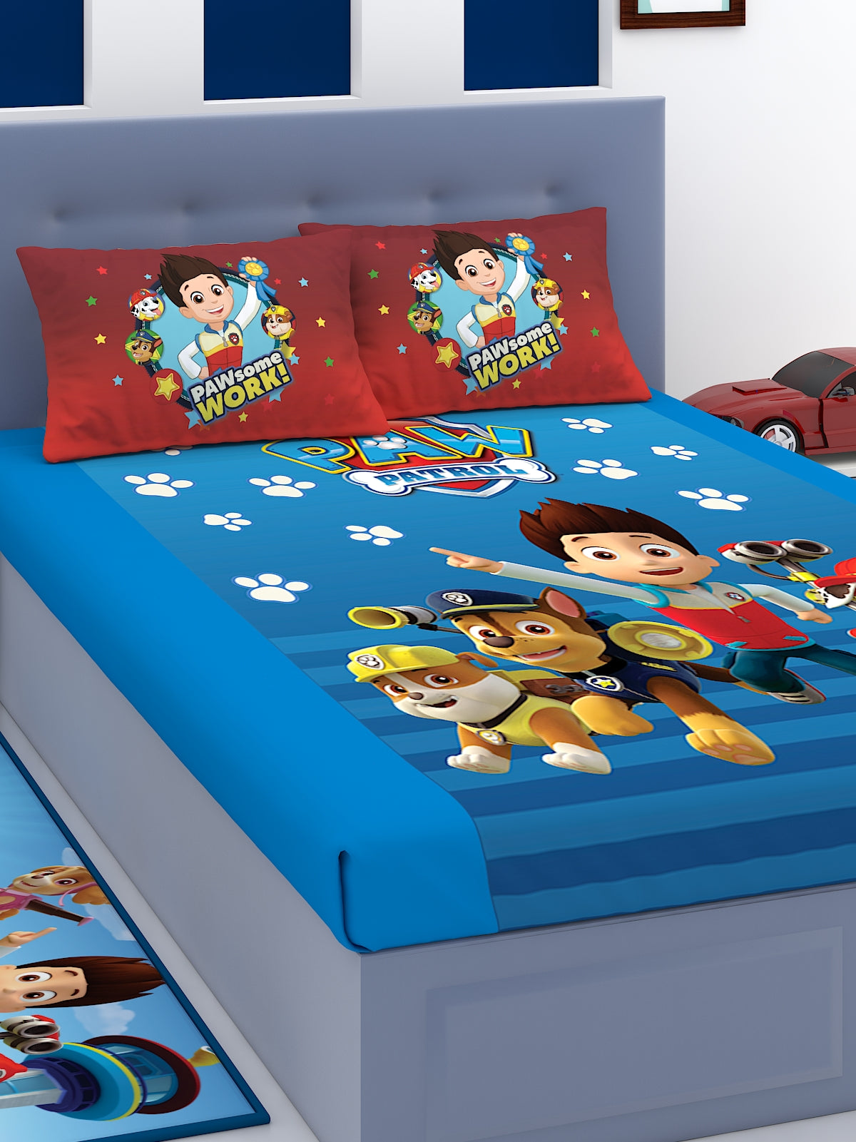 This Paw Some Work Paw Patrol cotton kids double bedsheet with 2 pillow cover by Athom Living features vibrant cartoon prints, soft fabric, and a kid-friendly design perfect for brightening any children's bedroom décor.