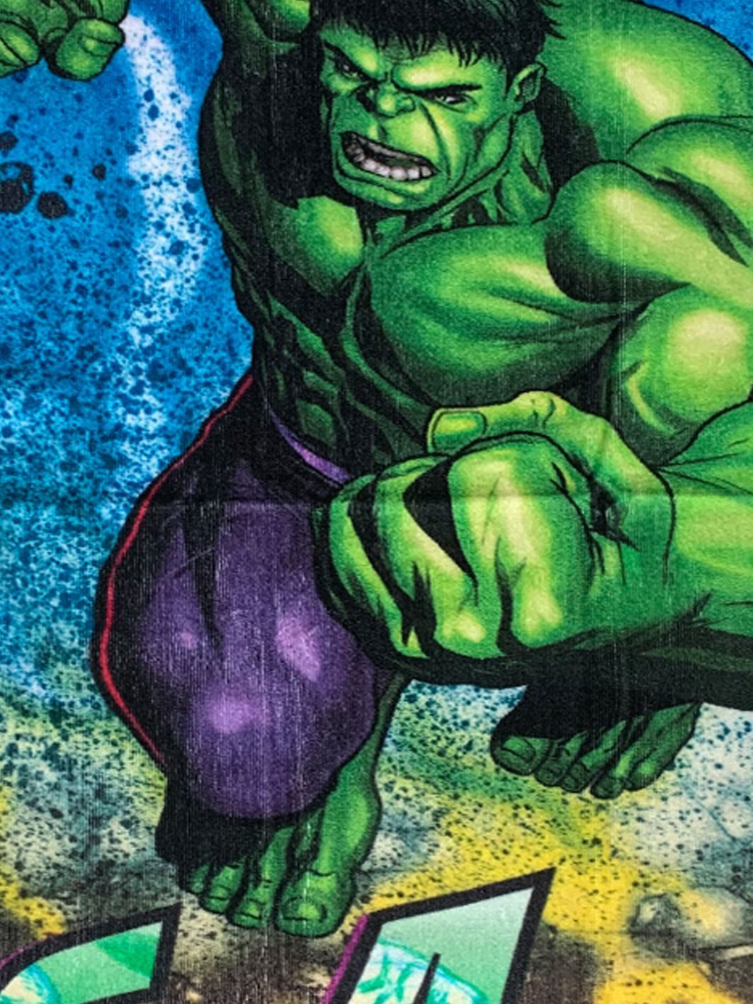 Vibrant Marvel Smash Green Hulk bath towel for kids crafted with premium 350 GSM cotton, providing softness and absorbency in a 60x120 cm size, designed for daily bathing or swimming activities.